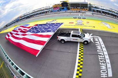 2017 Ford F-450 Super Duty pulling 45 by 92-foot American flag