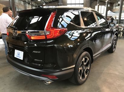 2017 Honda CRV Touring rear 3/4 view