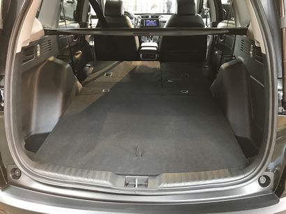 2017 Honda CRV Touring showing flat floor storage with back seats folded